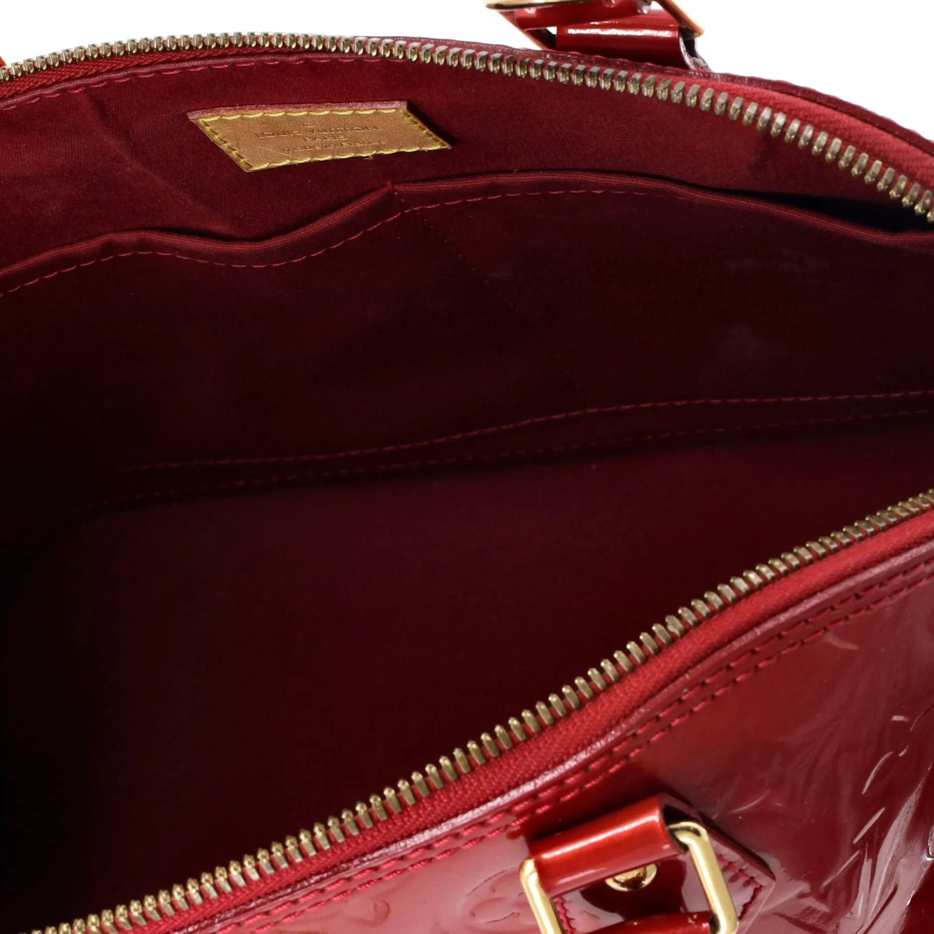 Alma Handbag Monogram Vernis PM